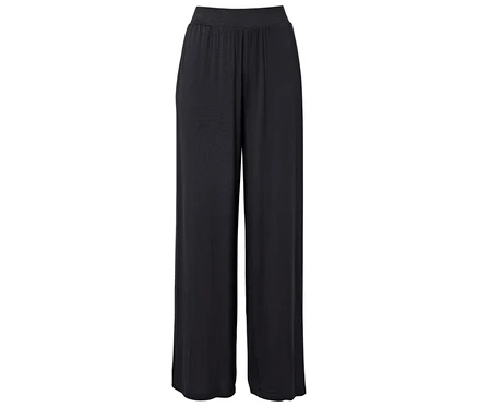 Schwarze, locker sitzende Hose mit elastischem Bund.