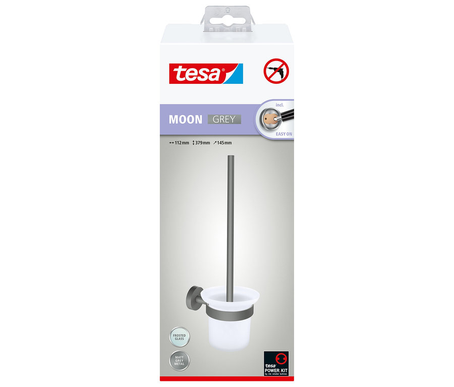tesa MOON WC-Bürstenhalter mit mattgrauem Metallhalter und mattiertem Glasbecher, auf weiß-grauer Produktverpackung.
