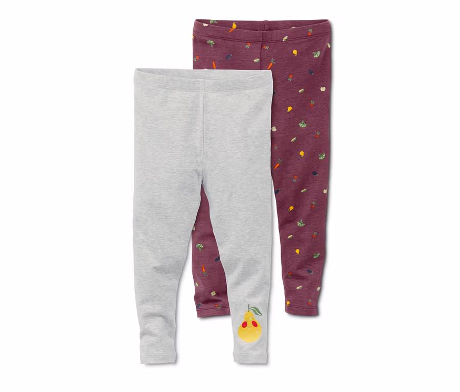 Zwei Leggings: eine graue mit Birnenmuster und eine lilafarbene mit Gemüse Muster.