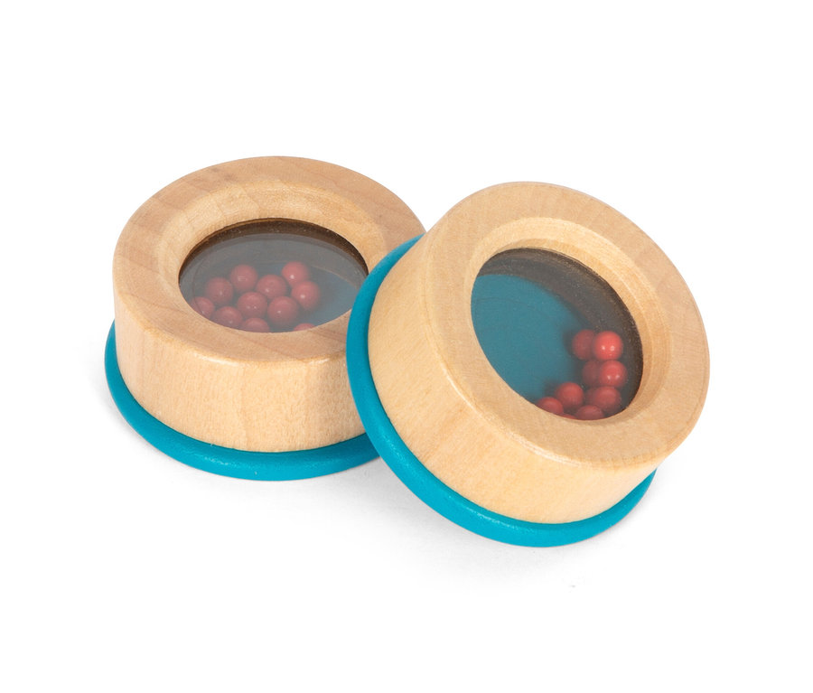 Zwei small foot Hör- und Fühl-Memo »Sensory« Spielzeuge mit roten Kugeln darin.