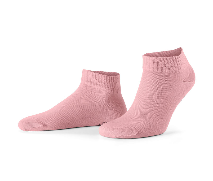 Zwei Paar rosa Yogasocken.