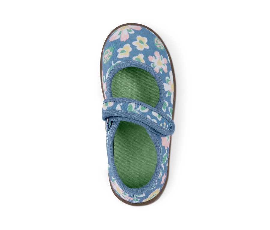 Detailaufnahme eines Klett-Ballerinas mit Blumenmuster.