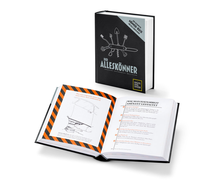 Aufgeschlagenes Buch »Der Alleskönner« mit Illustration einer unter einem Auto eingeklemmten Person.