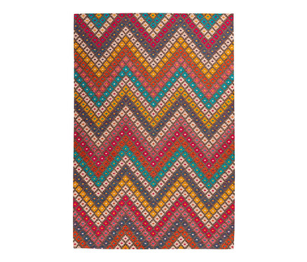 Ein mehrfarbiger Teppich mit Zickzackmuster.