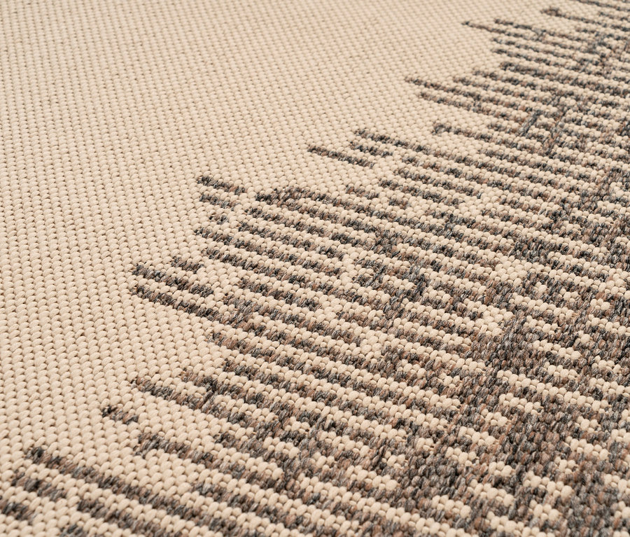 Detailansicht eines cremefarbenen Kayoom Outdoor-Teppichs »Splash 900« mit abstraktem Muster.