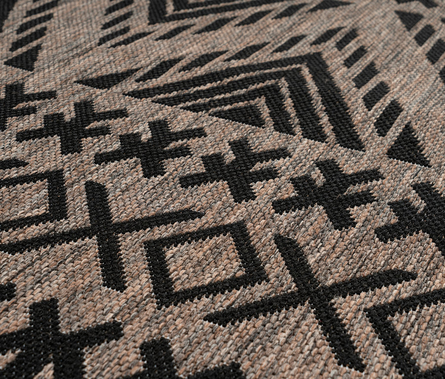 Detailansicht eines grauen Kayoom Outdoorteppichs »Splash 500« mit geometrischem Muster.