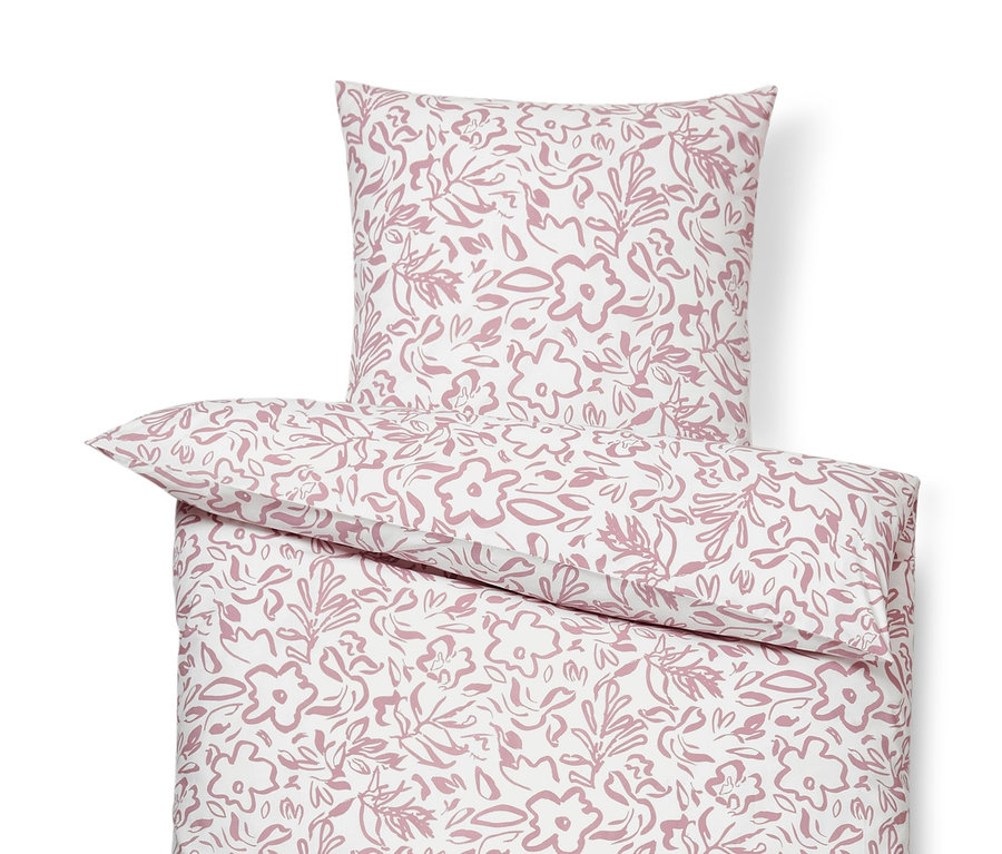 Bettwäsche-Set mit rosafarbenem Blumenmuster.