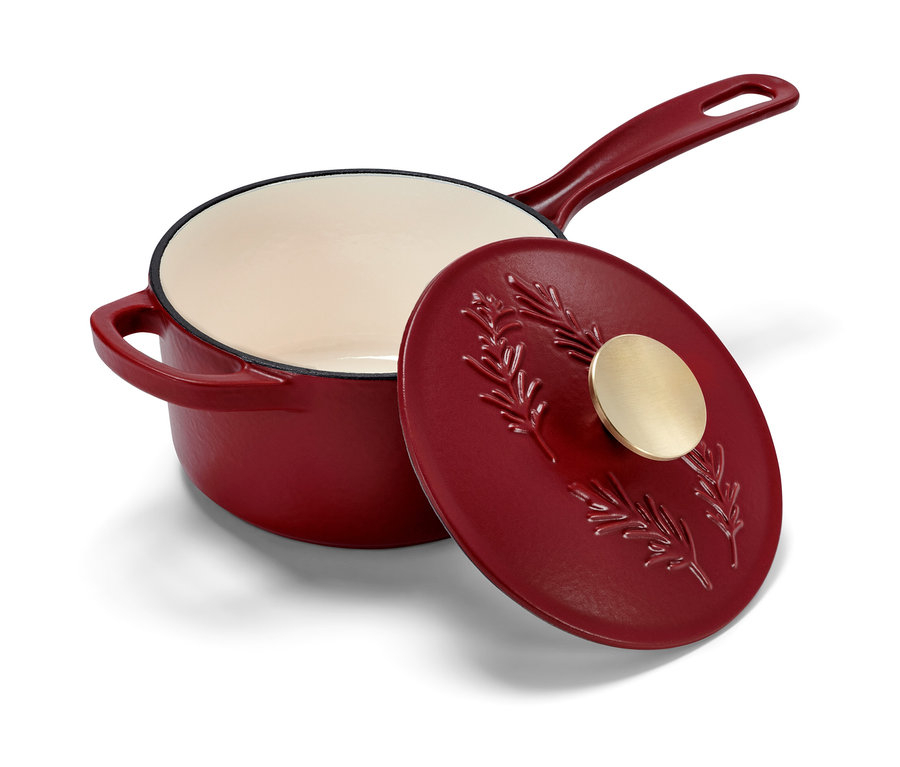 Rote Gusseisen-Stielkasserolle mit Deckel.