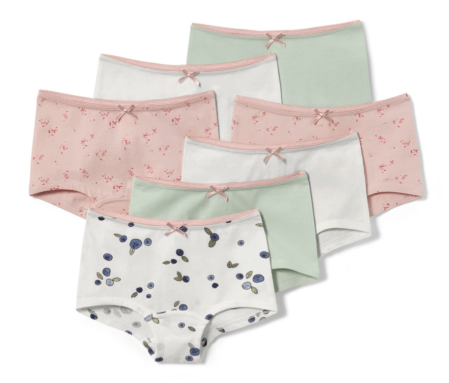 Ein Set aus sieben Kleinkind-Pantys in verschiedenen Farben und Mustern.