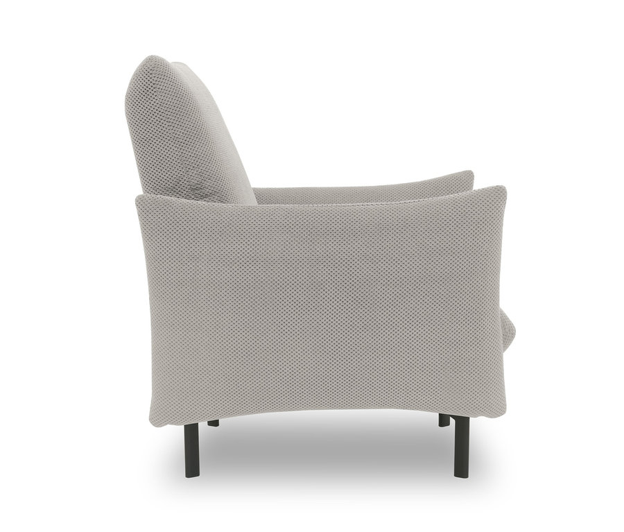 Seitenansicht des beigen DOMO collection Sessel »Avila«.