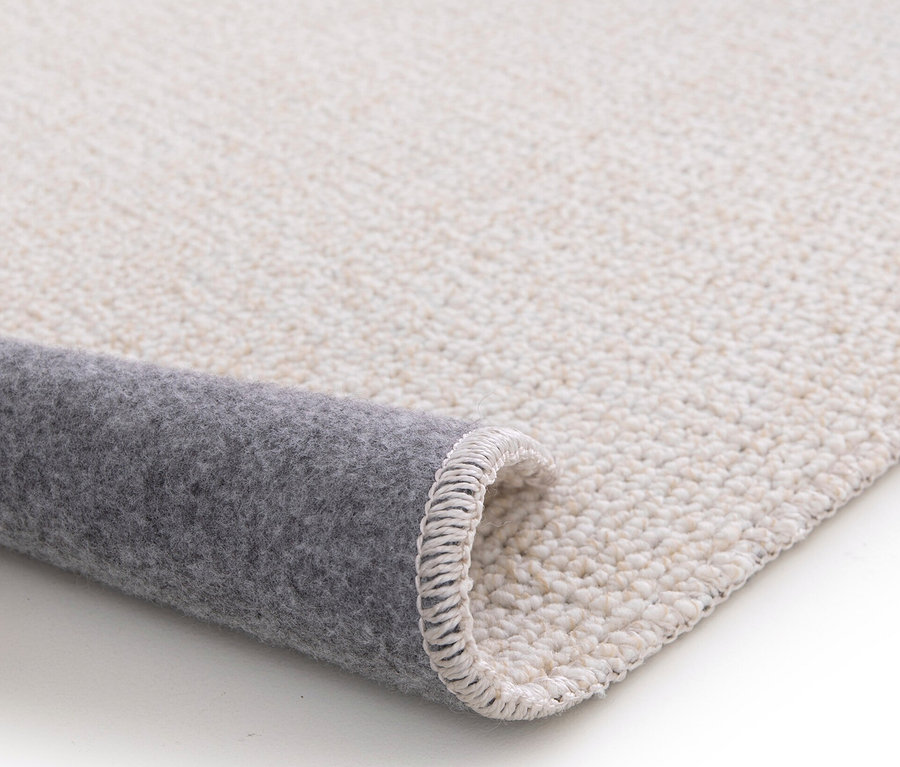 Detailansicht eines creme-farbenen Teppichs »Daisy«.