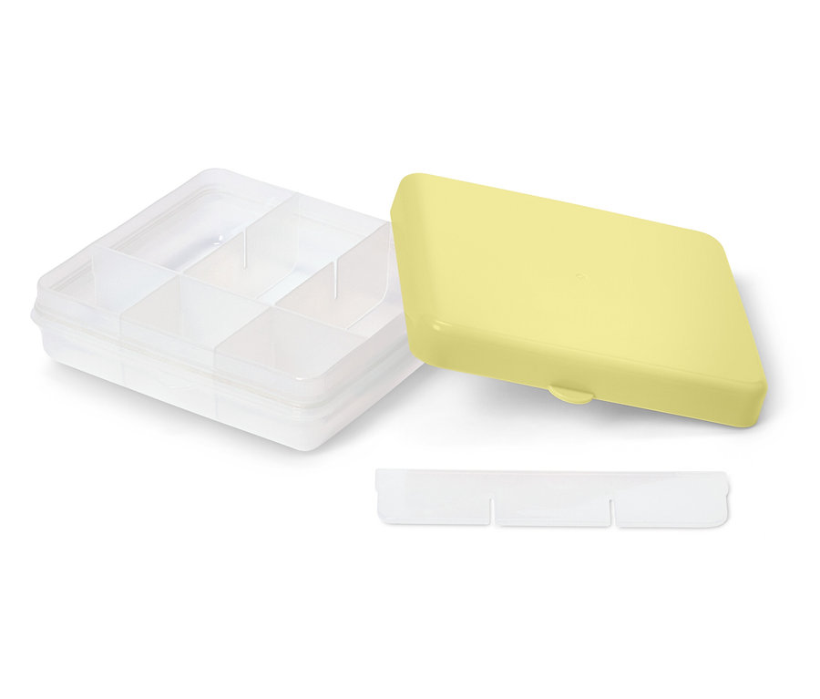 Durchsichtige Aufbewahrungsbox mit gelbem Deckel und herausnehmbaren Trennwänden.