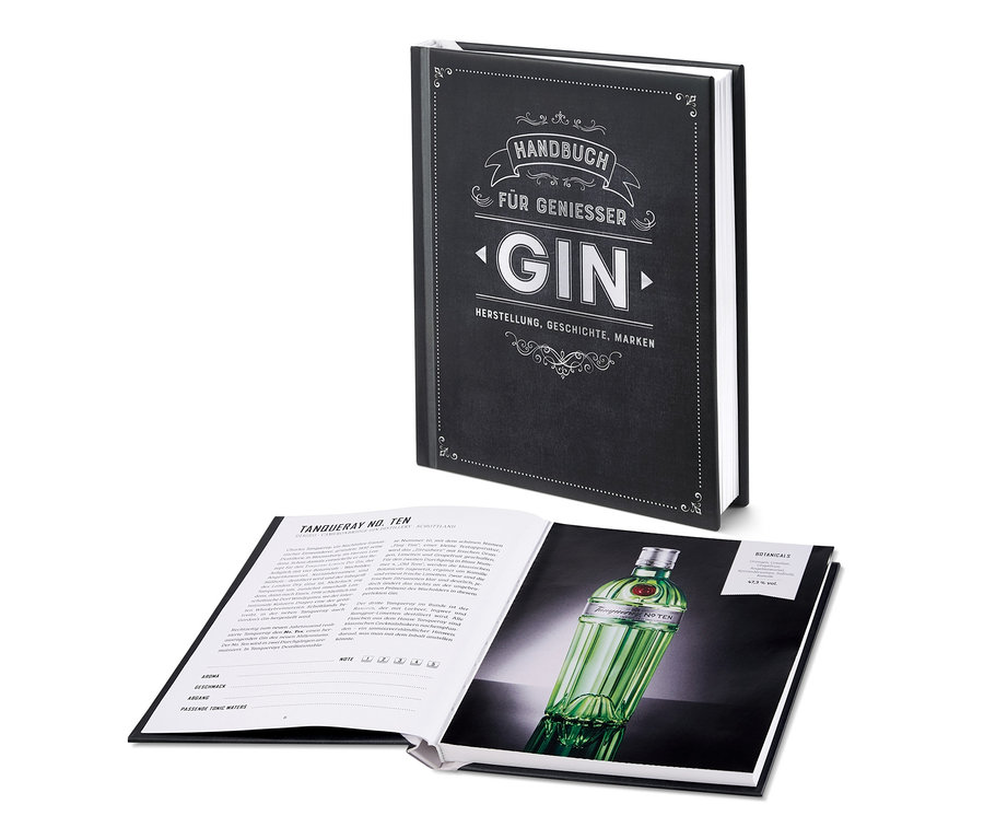 Das Buch "Gin – Handbuch für Genießer" ist geöffnet, auf den Seiten ist ein Foto einer Gin-Flasche zu sehen.