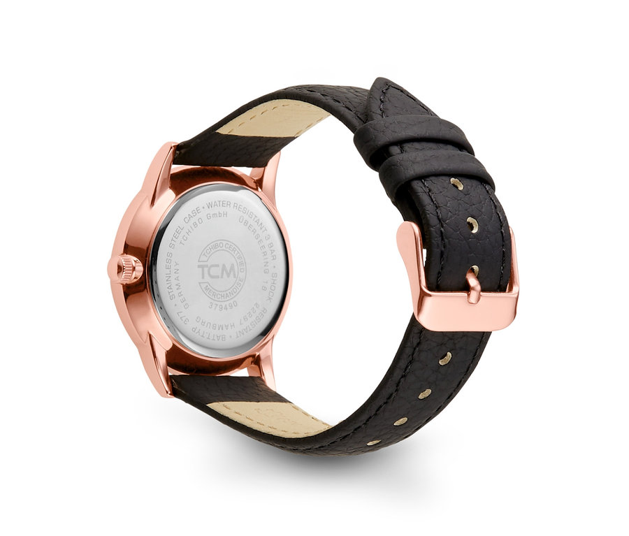 Detailansicht einer Damenuhr mit Lederarmband.