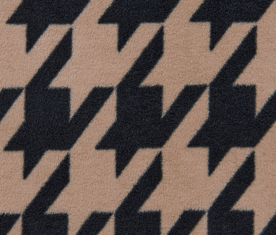 Detailaufnahme eines bedruckten Fleece-Loops mit Hahnentrittmuster.