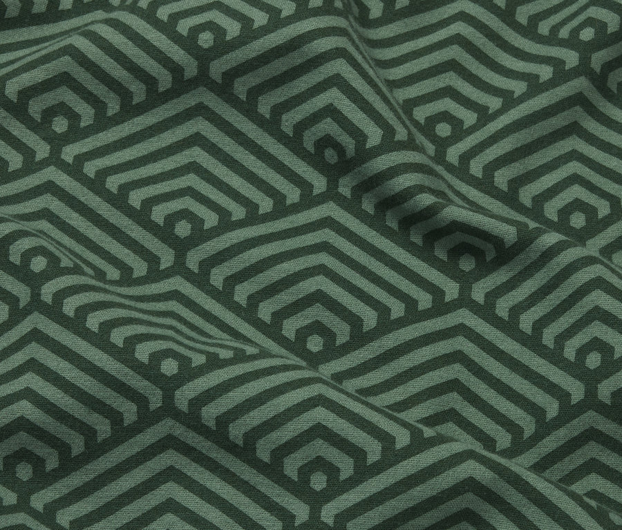 Nahaufnahme von dunkelgrüner Biber-Bettwäsche in Normalgröße mit geometrischem Muster.