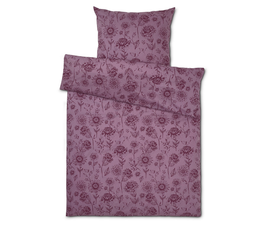 Lila Bettwäsche mit Blumenmuster, bestehend aus Kissen- und Deckenbezug.