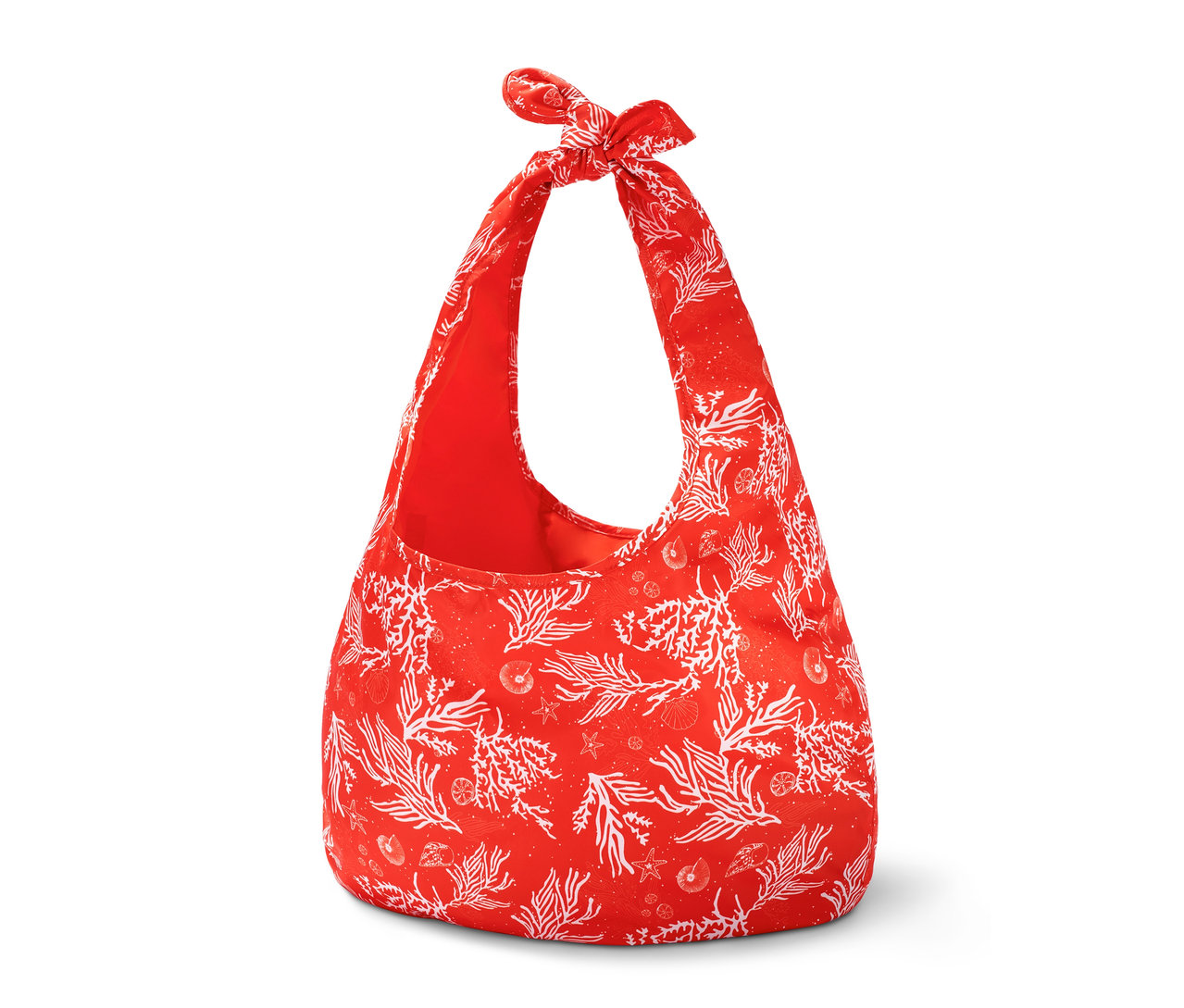 Eine rote faltbare Strandtasche mit weißem Korallenmuster.