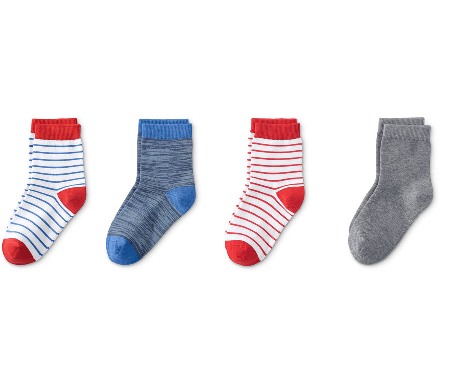 Fünf Paar Socken in verschiedenen Farben und Mustern.
