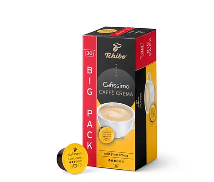 Packung mit 30 Kapseln Cafissimo Caffè Crema mild. Die Schachtel ist rot-schwarz-gelb. Eine Kapsel liegt neben der Packung.