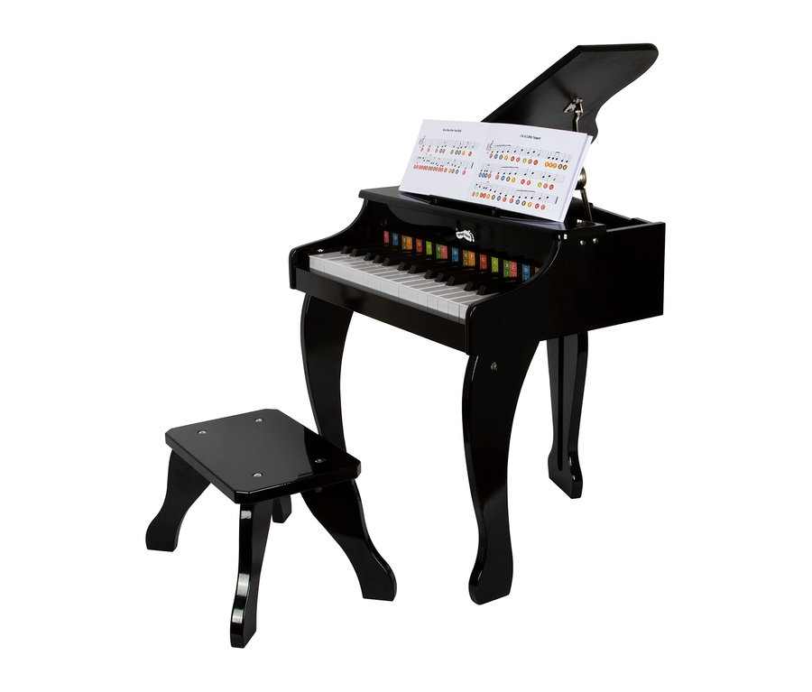 Schwarzer small foot elektronischer Kinderflügel mit Noten auf dem Notenständer und passendem schwarzem Hocker.