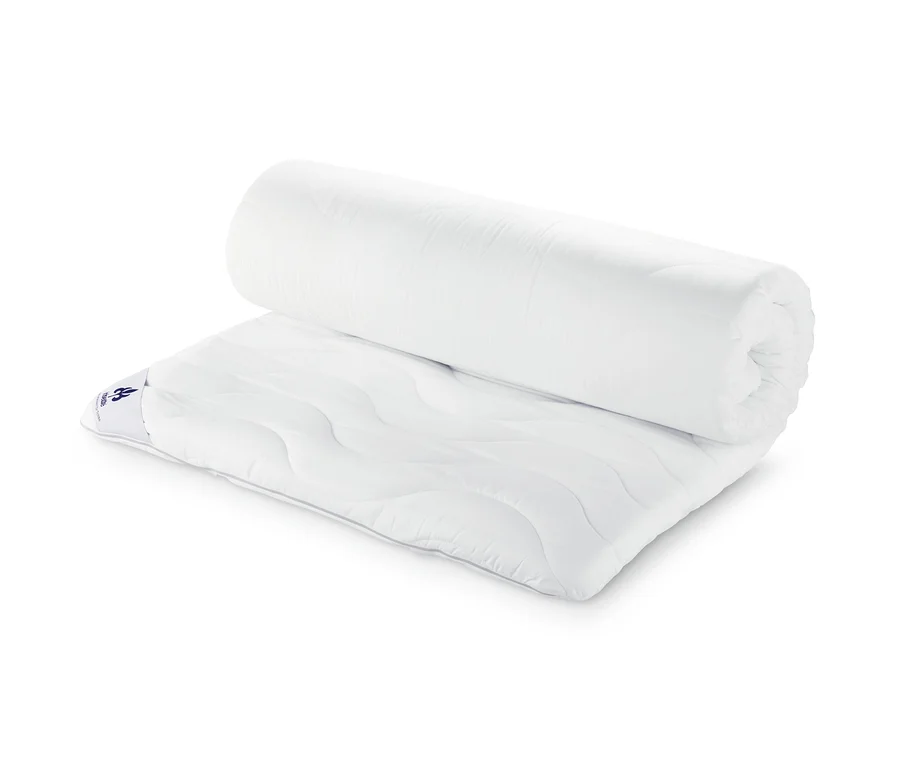 Gerollter irisette® greenline Matratzentopper, ca. 140 x 200 cm.