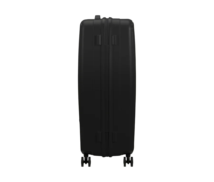 Schwarzer, großer American Tourister Rejoy Spinner Koffer, von der Seite stehend, mit Rollen.