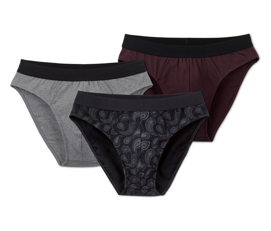 Drei Slips: grau, bordeauxrot und schwarz mit Paisley-Muster.