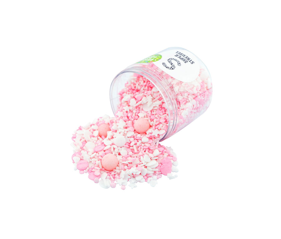 Rosa und weiße Super Streusel »KnuddelFee« Zuckerstreuselmix fallen aus einem durchsichtigen Behälter.