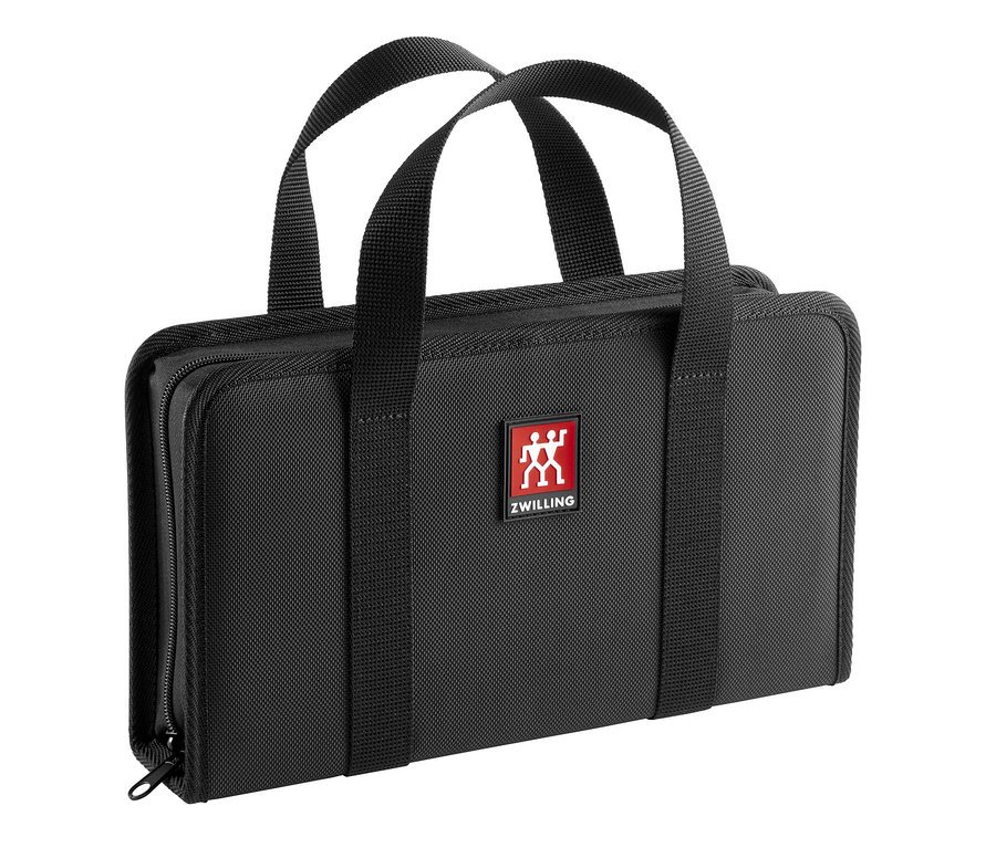 Schwarze ZWILLING Messer-Traveller-Set Tasche mit zwei Griffen und Reißverschluss.