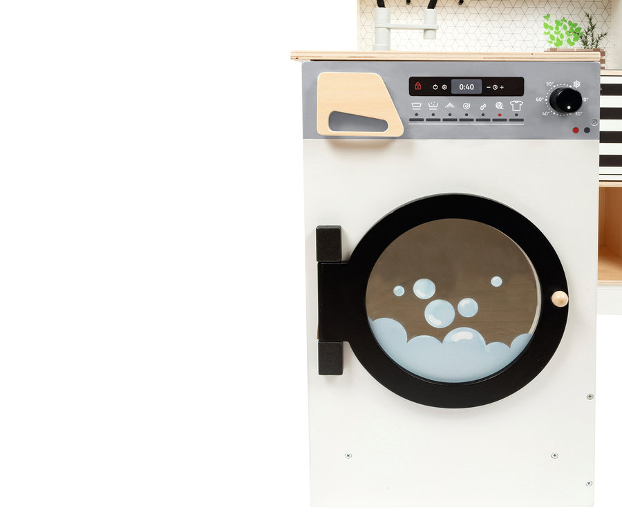 Die Waschmaschine, als Teil der small foot Kinderküche modular XL, hat eine schwarze, kreisförmige Öffnung mit einer Abbildung von Blasen.