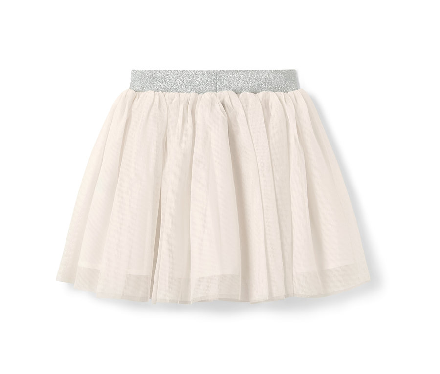 Ein Kinder-Tüllrock in Creme mit einem glitzernden silbernen Bund.