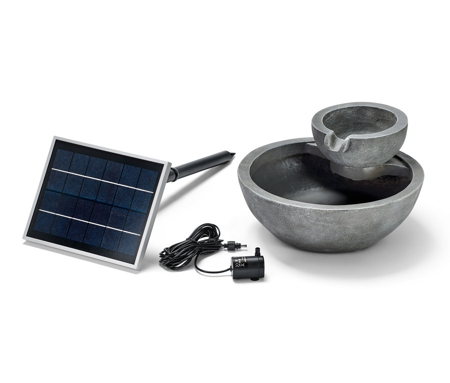 Solar-Gartenbrunnen mit Solarpanel und Pumpe.