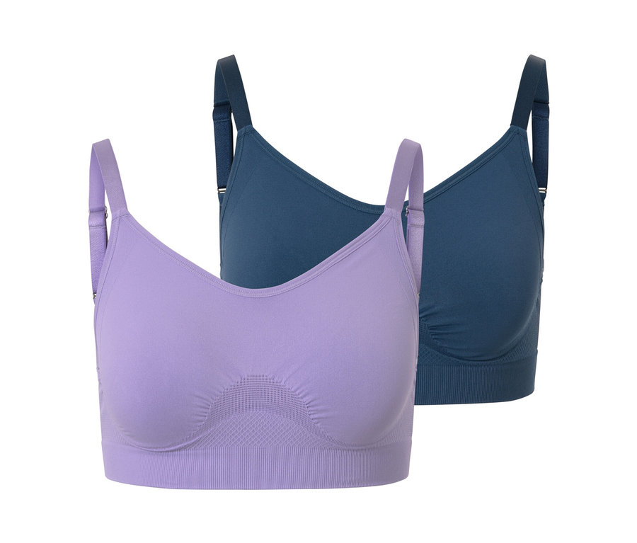 Zwei Seamless-Sport-BHs in Blau und Flieder.