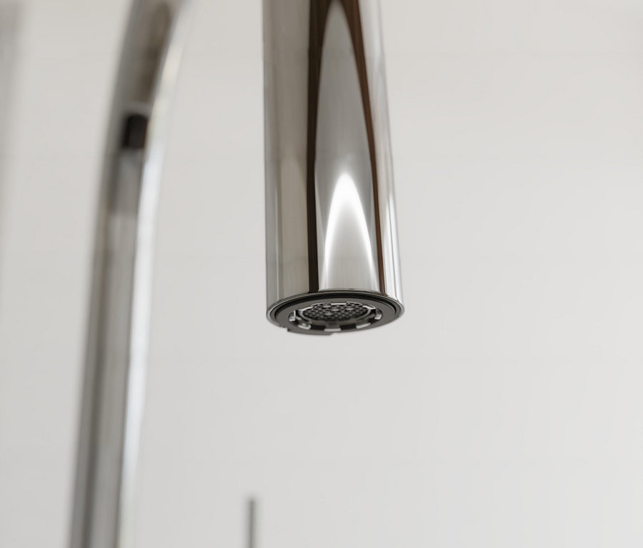 Detailaufnahme eines verchromten Wasserhahns.