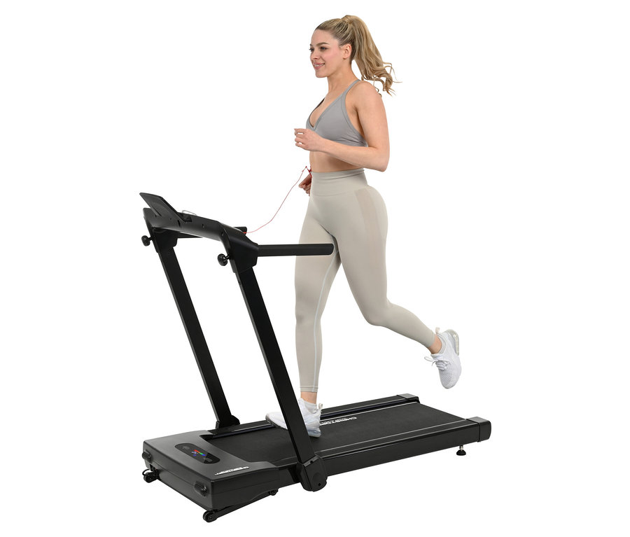 Frau läuft auf einem schwarzen 2 in 1 Laufband.