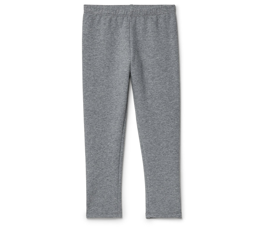 Graue Leggings liegen auf einem weißen Hintergrund.