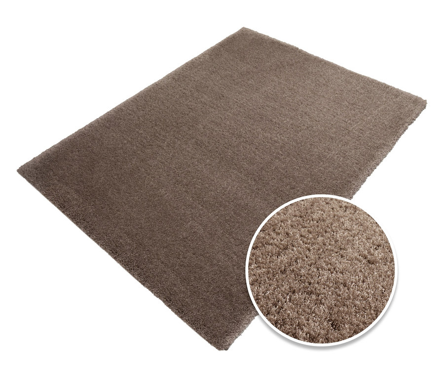 Ein taupefarbener Teppich »Pleasure« wird gezeigt.