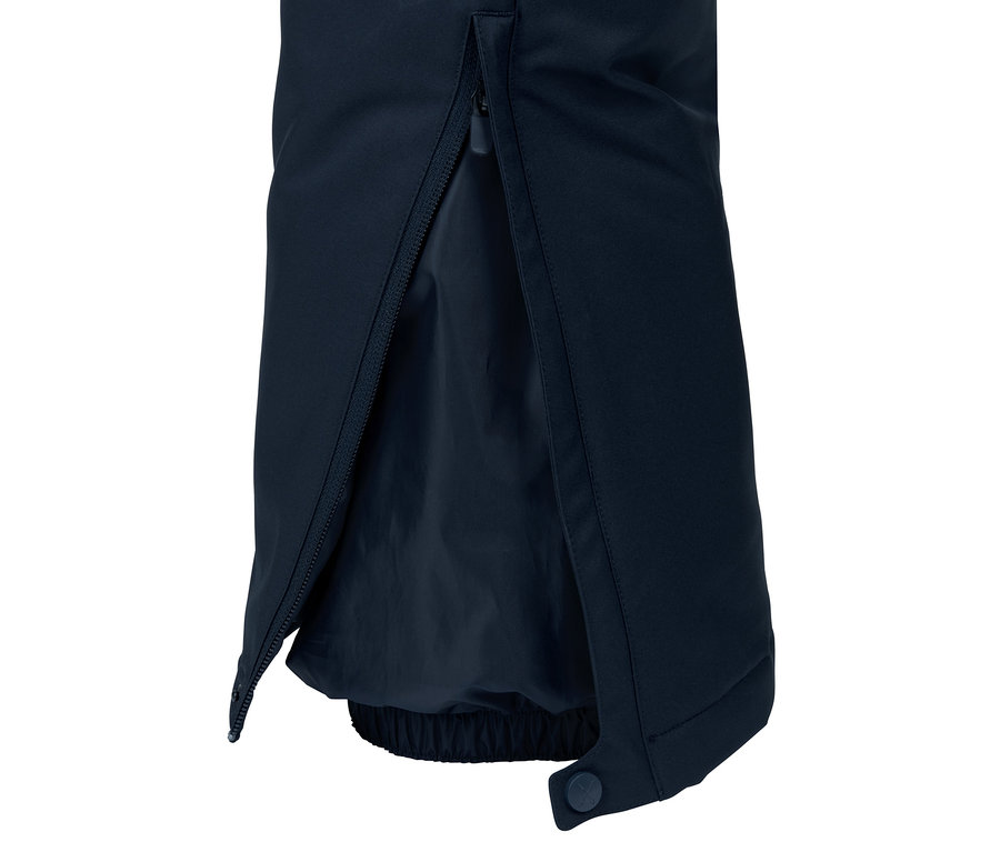 Detailansicht einer Skihose mit geöffnetem Reißverschluss am Hosenbein.