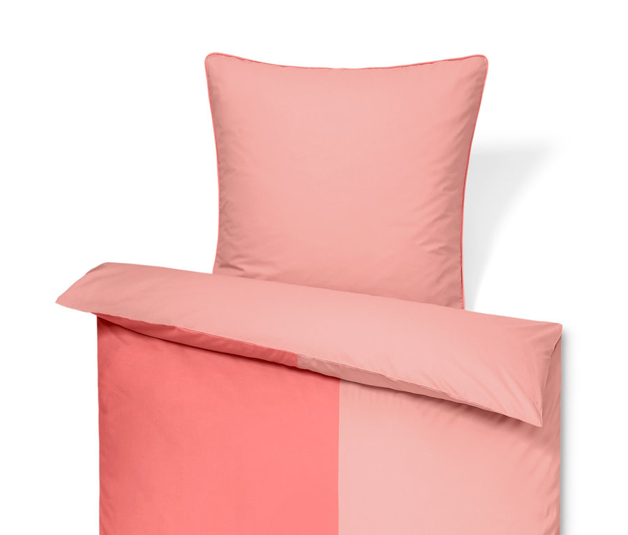 Premium-Baumwoll-Bettwäsche in Übergröße und Normalgröße in Rosatönen.