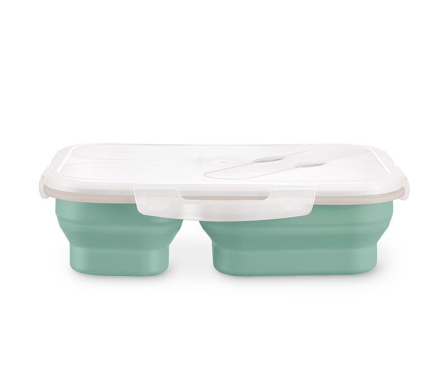 Eine mintgrüne, faltbare Lunchbox mit weißem Deckel.