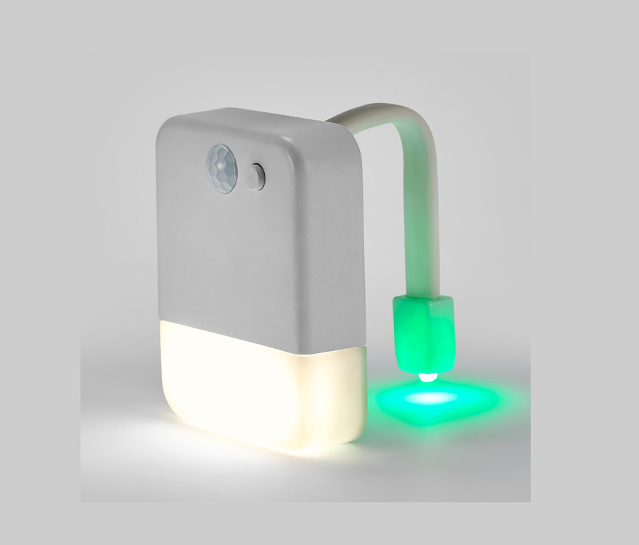 Graues LED-Toilettennachtlicht mit Bewegungsmelder. Der untere Teil des Lichts leuchtet weiß, während eine kleine Lampe darunter grün leuchtet.