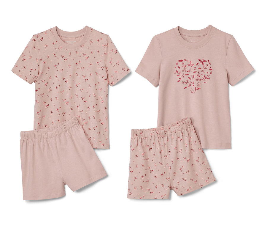 Zwei kurze Kleinkind-Pyjamas mit Blümchenmuster.