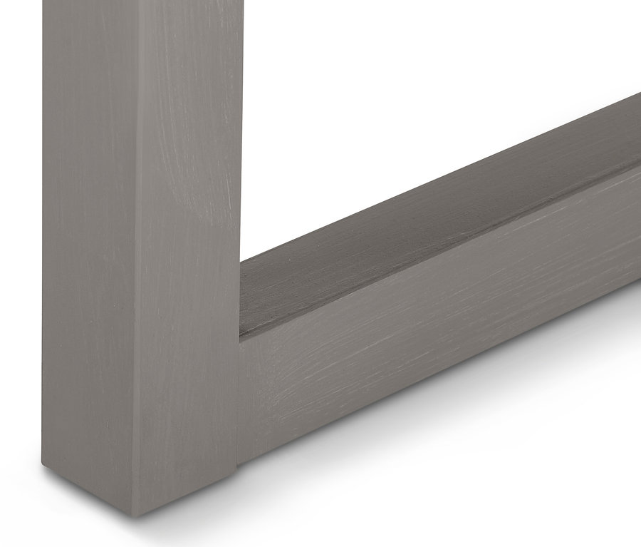 Detailansicht eines grauen Sekretärs mit seitlicher Umrandung.