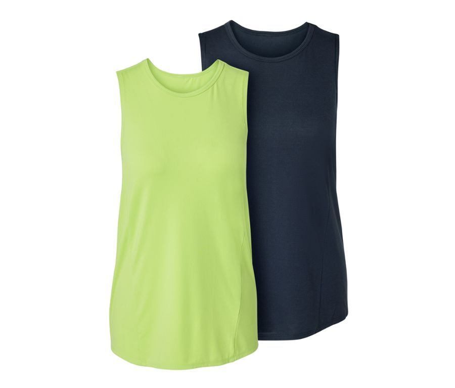 Frau posiert in einem limefarbenen Sport-Top aus einem zweiteiligen Set und gemusterten Leggings.