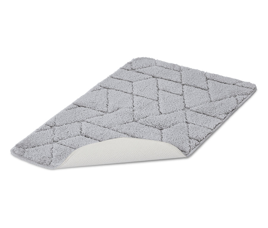 Grauer Badezimmerteppich mit geometrischem Muster und rutschfester Unterseite.