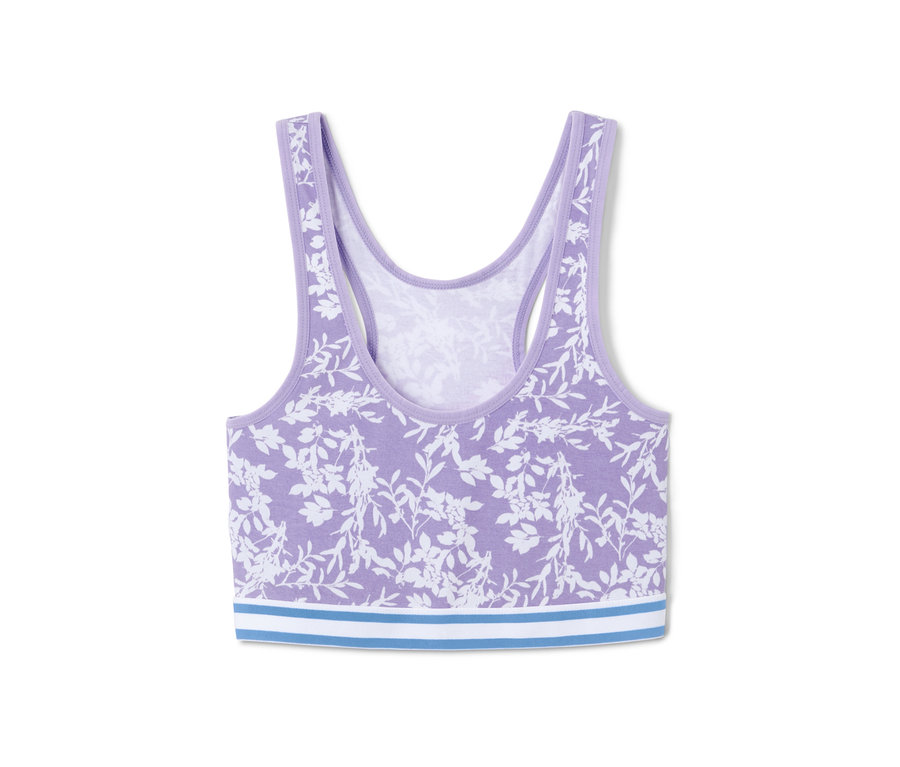 Ein lila Bustier mit weißem Blumenmuster, aus einem 3er Set.
