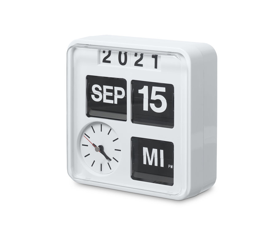 Eine weiße Wanduhr mit Kalender zeigt den 15. September 2021.