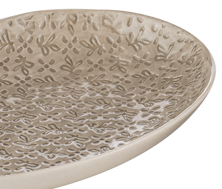 Detailansicht eines »Tirari« Tellers mit Blumenmuster.