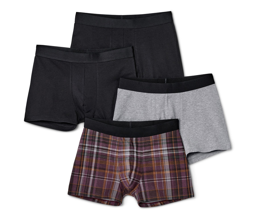 Vier Slipboxer: zwei schwarze, ein grauer und ein karierter.